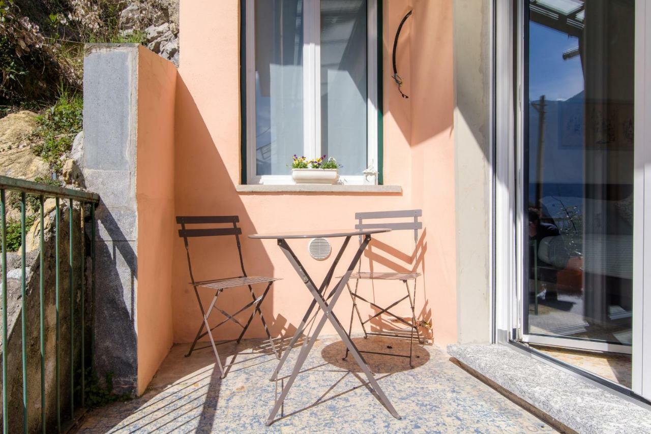 Al Pontile - The House Of Travelers Vila Sala Comacina Exterior foto